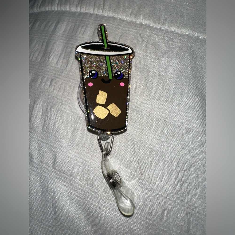 Cup badge reel